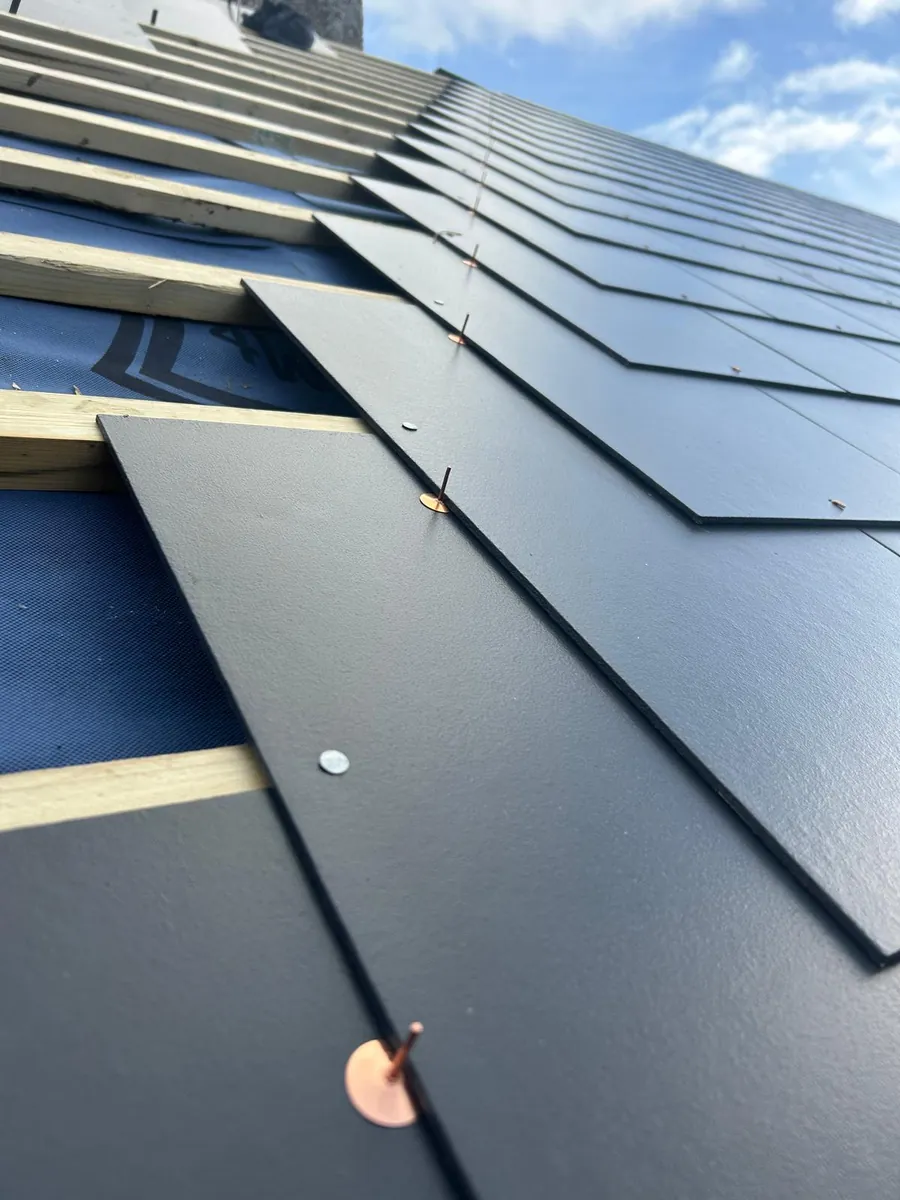 Close detail of a newly slated roof slope