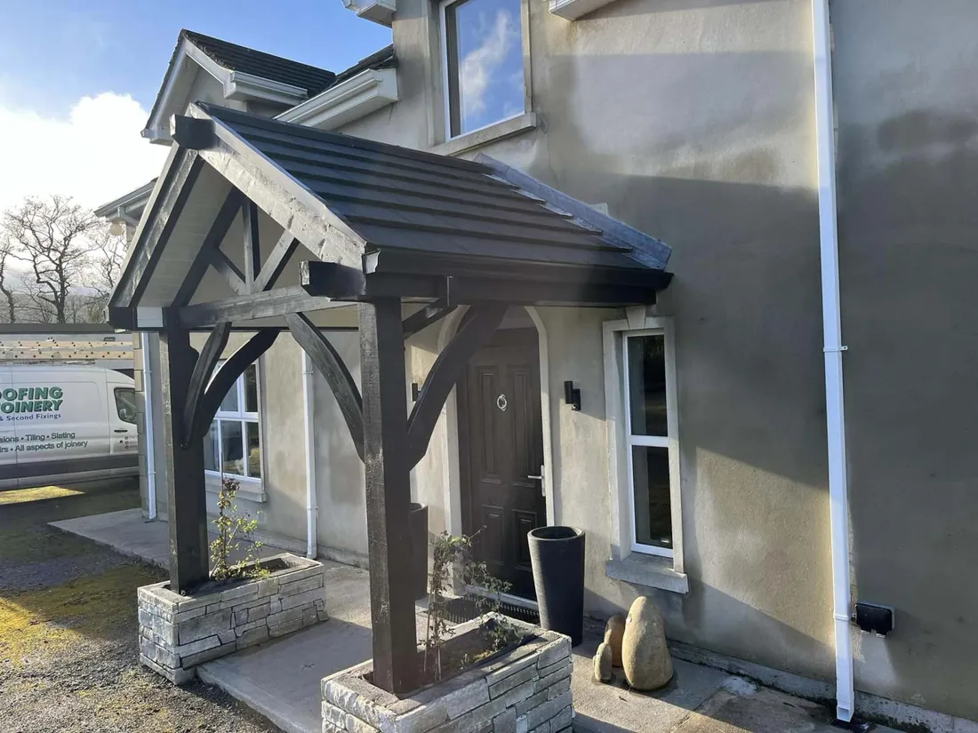 Bespoke oak porch canopy over a house entrance