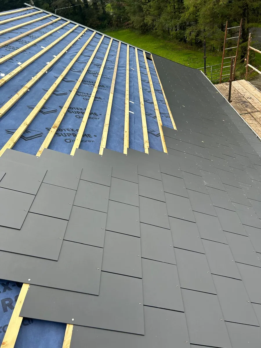 Timber battens fixed over a breathable membrane on a new slate roof